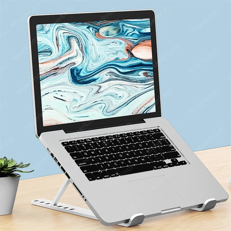 Adjustable Foldable Laptop Stand for Desk & Travel\ Portable Ergonomic Laptop & iPad Stand Holder\ Universal Laptop Riser & Tablet Mount Base\ Foldable MacBook Stand for Office & Home Use\ Slim Travel Laptop Holder for Tablets & Notebooks\ TollyTech
