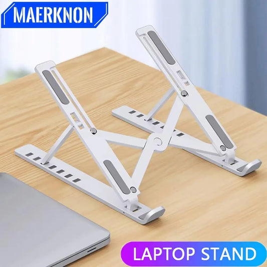 Adjustable Foldable Laptop Stand for Desk & Travel\ Portable Ergonomic Laptop & iPad Stand Holder\ Universal Laptop Riser & Tablet Mount Base\ Foldable MacBook Stand for Office & Home Use\ Slim Travel Laptop Holder for Tablets & Notebooks\ TollyTech

